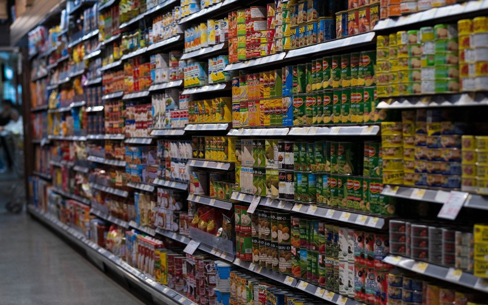 A shelf of packets at adult eye height